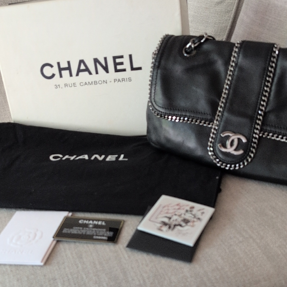 CHANEL Black Leather Bag with Silver Chain